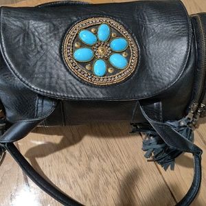 Charm and Luck leather satchel